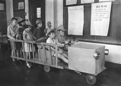 Children in homemade fire truck