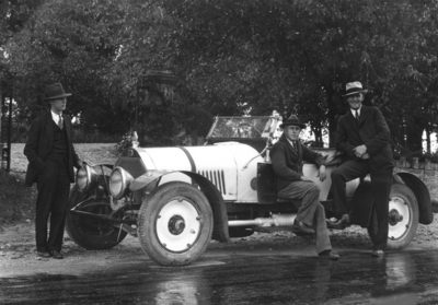 Three men and a car