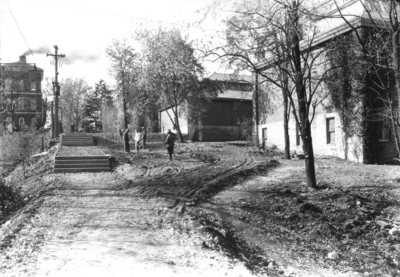 Walkway leading to Botanical Gardens, winding between White Hall and Barker / Buell Armory and ending at the Student Union