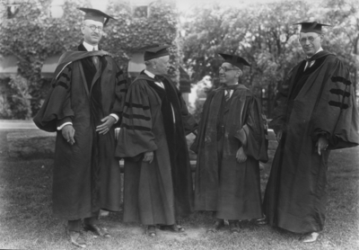 Four men, second from left is Dean F. Paul Anderson, far right is Richard Stoll, Board of Trustees