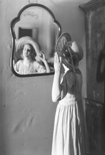 Actress posing in mirror