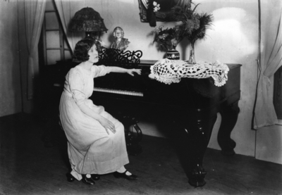 Actress at a piano