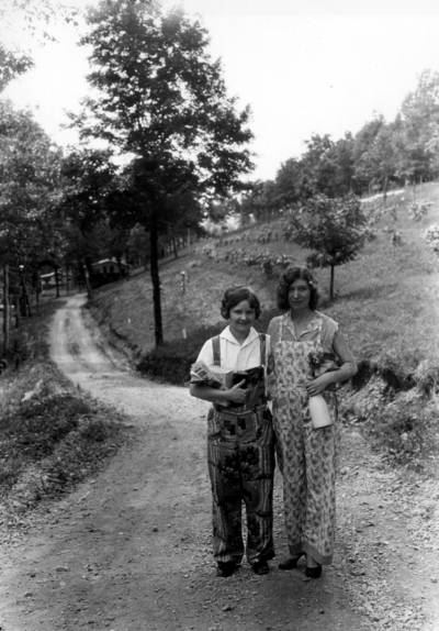 Two women on a dirt road