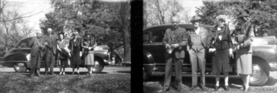 Unidentified people in front of cars