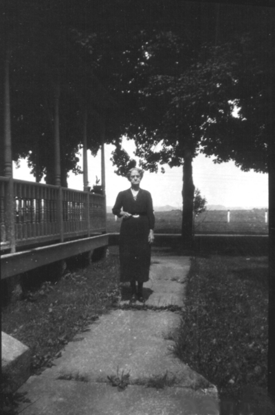 Unidentified woman on front walkway