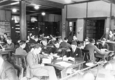 Old Law Library interior, students studying (later Administration Annex)
