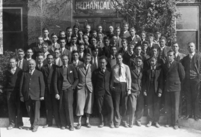 Group photograph in front of Mechanical Hall (the original Anderson Hall)