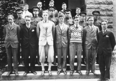 Group photograph, eighteen unidentified young men, six in military uniform