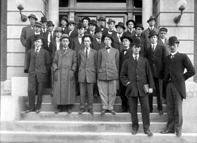 Group photograph, Law students in front of Frazee Hall, Judge Lafferty, 1st Head of Law School, far right in front of Frazee Hall