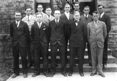 Twelve unidentified men in Group photograph, YMCA, Bart Peak- left rear, Virgil Couch- second from right front