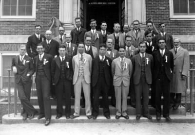 Group photograph, members of Journalism group, Omicron Delta Kappa. Enoch Grehan, Head of School of Journalism, in second row, standing in front of McVey Hall, and Dr. Miner, Head of Psychology department