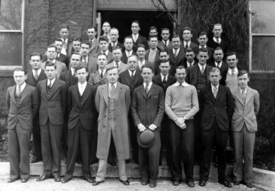 Group photograph on steps of Mechanical Hall, the original Anderson Hall, Goethals Engineering Society, includes Professor Freeman