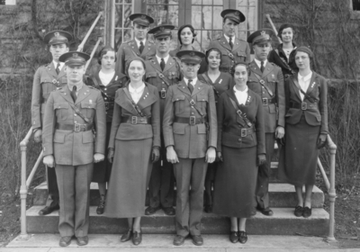 Group photograph, unidentified men and women in military officers' uniforms, company commanders and sponsors