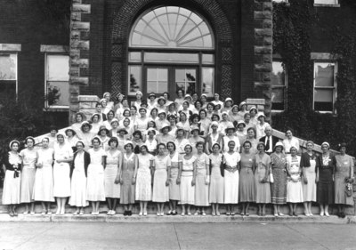 Group photograph on steps of Miller Hall, women of Phi Upsilon Omicron (national)