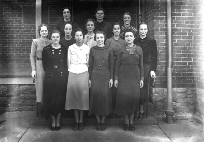 Nine unidentified women on steps of Patterson House (YWCA?)  house of  former President James K. Patterson