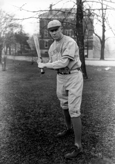 Kentucky Baseball player posing with bat