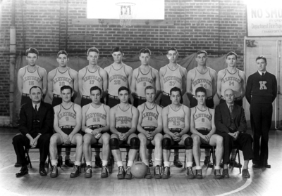 Kentucky Men's basketball team, Coach Adolph Rupp seated on left, 1934-1935 SEC Champions