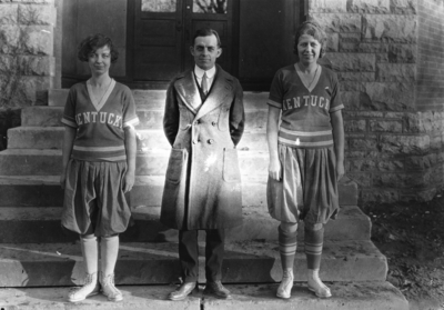 Women's basketball players, and one unidentified man