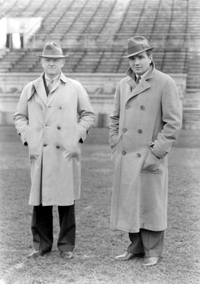 Football coaches Boles and Chet Wynne at Stoll field
