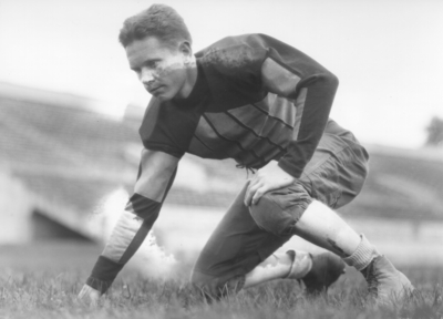 Kentucky football player in three point stance