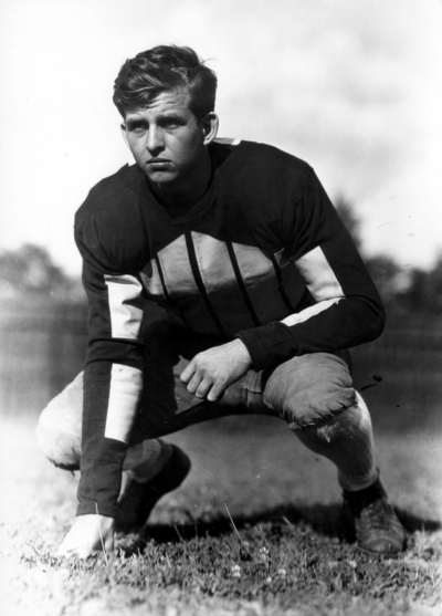 Kentucky football player in three point stance