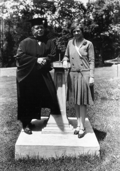 Dean F. Paul Anderson, Engineering, and Ethel Jelley his secretary,  by the sun dial in front of Mechanical Hall (the original Anderson Hall) on University of Kentucky Campus