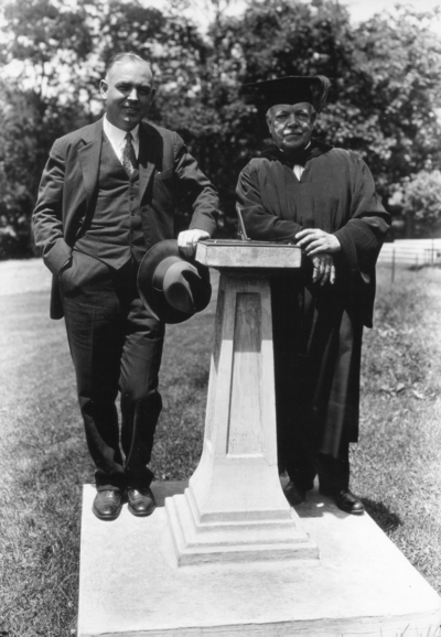 Dean F. Paul Anderson, Engineering, and unidentified man by the sun dial in front of Mechanical Hall (the original Anderson Hall)