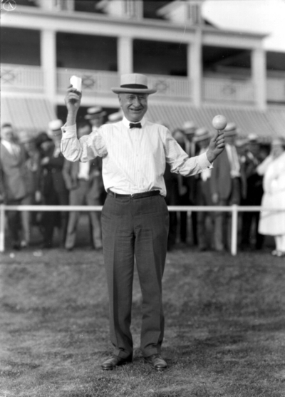 Convention of American Society of Heating and Ventilating Engineers, unidentified man with glass and oversize golf ball, Lexington Country Club