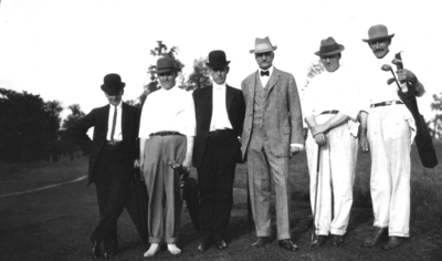 Six men golfing