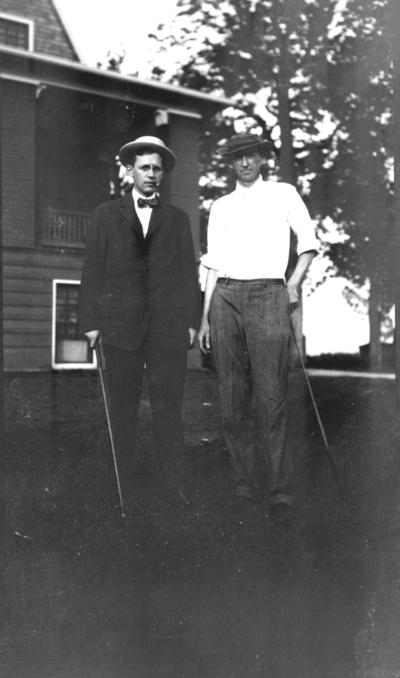 Richard Stoll, left, Board of Trustees member, for whom Stoll Field was named