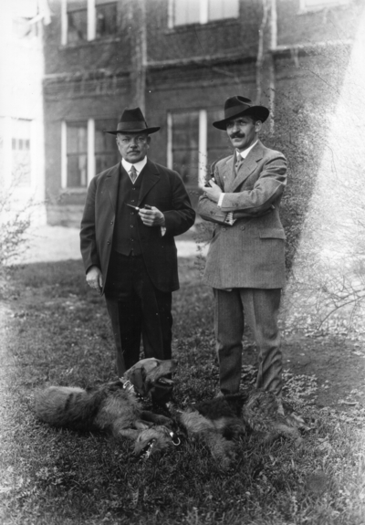 Dean F. Paul Anderson, Engineering, unidentified man and two dogs