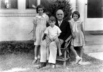 Professor C. M. Knapp and family, older man (Knapp's father?) and three children