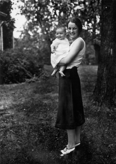 Unidentified woman holding an infant, family of President Frank L. McVey, 1917-1940