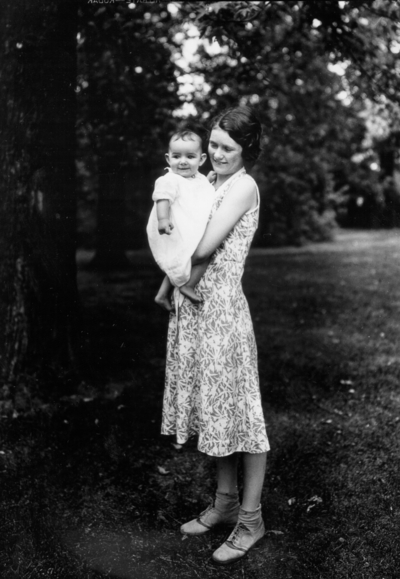 Unidentified woman holding an infant, family of President Frank L. McVey, 1917-1940