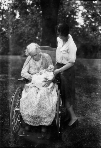 Family of President Frank L. McVey, 1917-1940, unidentified woman and Frank L. McVey's mother in wheelchair holding an infant