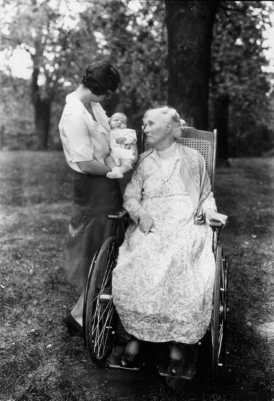 Family of President Frank L. McVey, 1917-1940, President Frank L. McVey's mother in wheelchair, and unidentified woman holding an infant