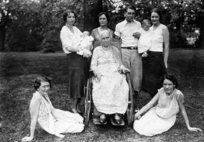 Family of President Frank L. McVey, 1917-1940, five unidentified women, infants, one unidentified man and President Frank L. McVey's mother in wheelchair