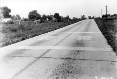 Unidentified road approaching railroad crossing