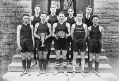 Lexington High School (later Henry Clay High School) basketball team with trophy