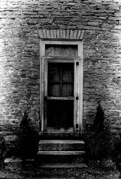 Sims estate, exterior door of stone house