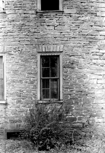 Sims estate, exterior window of stone house
