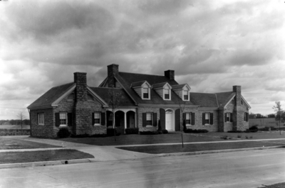 New house in new suburb surrounded by fields