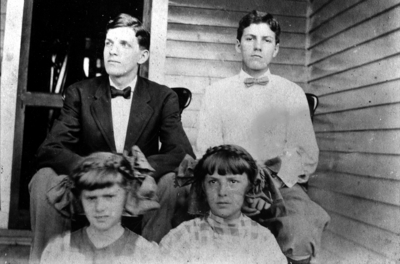 Two young unidentified men and two unidentified young women