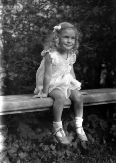 Unidentified girl on bench