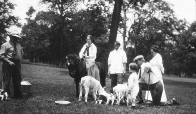 Mr. Sims'?, family group with dogs and ponies