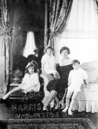 Unidentified woman with three children