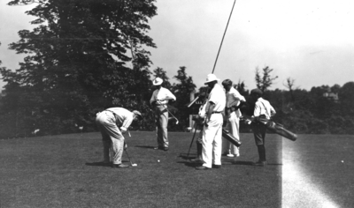 Unidentified men golfing