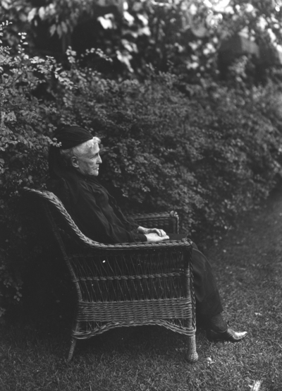 Unidentified older woman in a chair on the lawn at Ashland