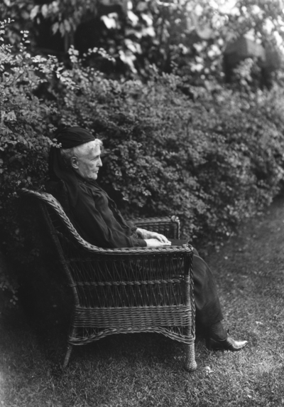 Unidentified older woman in a chair on the lawn at Ashland