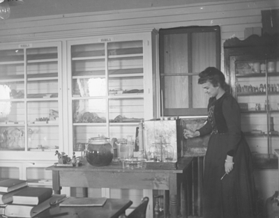 a woman who appears to be working in a science lab